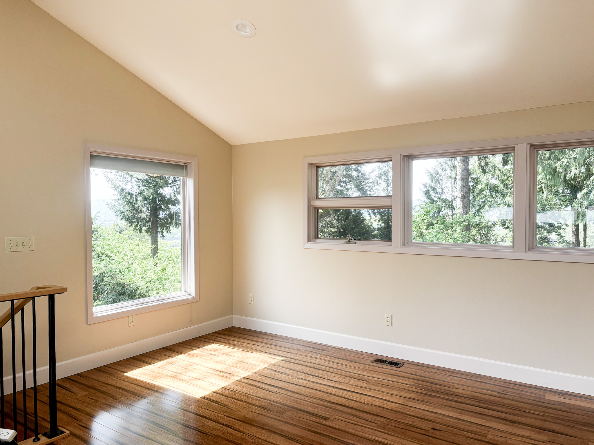 Office space with hardwood floors and garden views